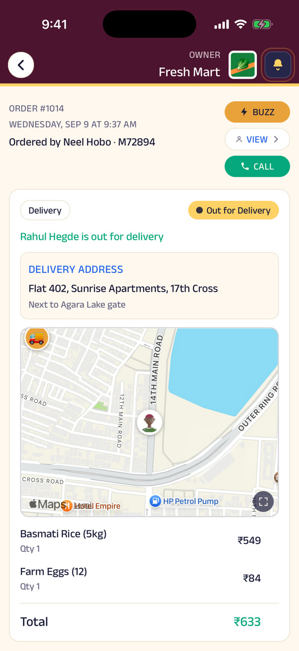 The business's own view of an order out for delivery — the rider, the map, and a buzz if the customer needs one